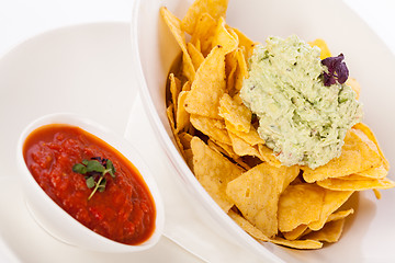 Image showing Crisp corn nachos with guacamole sauce