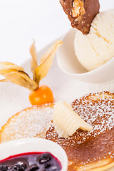 Image showing tasty sweet pancakes with vanilla icecream and topping