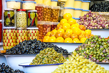 Image showing Olives and pickles on display at a farmers market