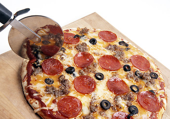 Image showing Home Backed on Wood Board Cutter Slicing Meat Pizza