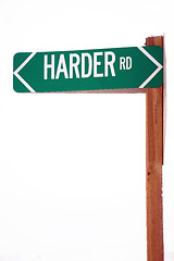 Image showing Harder Road Street Sign in Snow Storm Rural Highway