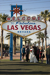 Image showing Couple Gets Married Wedding Under Welcome to Las Vegas Sign