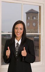 Image showing Office Worker Business Woman Smiles Showing Thumbs Up