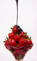 Image showing Chocolate hits the Strawberries in Parfait Dessert Glass