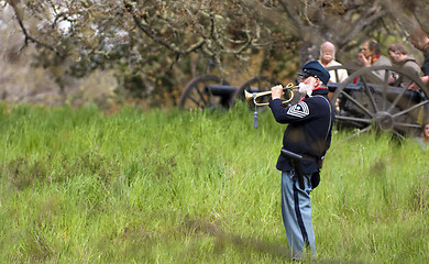 Image showing Civil War Reenactment Union Soldier Buglar Sounds Call During Ba