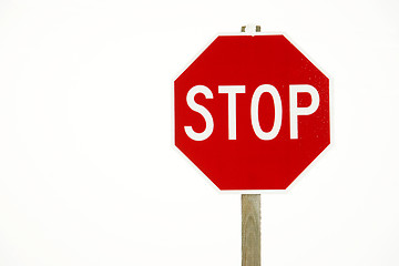 Image showing Stop Sign in Snow Snorm Rural Road