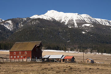 Image showing Red Barn Outbuilding Mountain Ranch Homestead Western United Sta