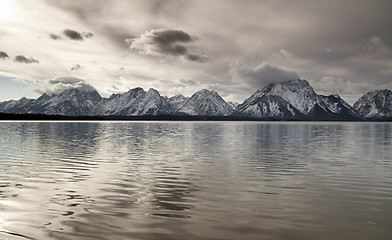 Image showing Lake Reflection Cloud Cover Jagged Peaks Grand Teton Wyoming 