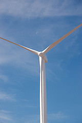 Image showing Wind Power Generator With Moon and Blue Sky Background