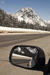 Image showing Driver Checks Rear View Mirror Motoring North Cascades Washingto