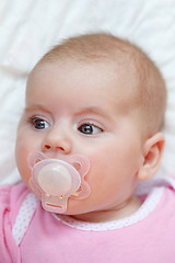 Image showing adorable baby with pacifier
