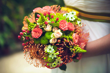 Image showing Bride with bouquet, closeup