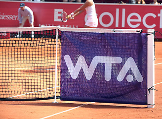 Image showing wta-logo  on tennis net