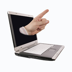 Image showing pointing hand coming out from a laptop