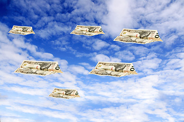 Image showing dollars flying