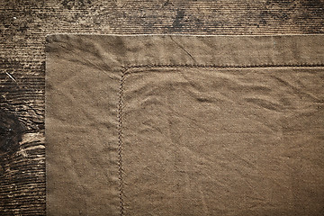 Image showing linen napkin on wooden table