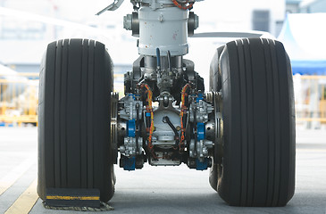 Image showing Rear landing gear of wide-body airplane