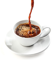 Image showing coffee pouring into cup