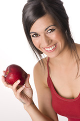 Image showing An Apple a Day Woman Smiles Holding Fresh Fruit