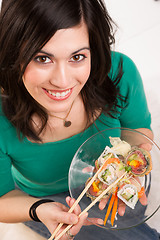 Image showing Candid Close Portrait Cute Brunette Woman Raw Food Sushi Lunch