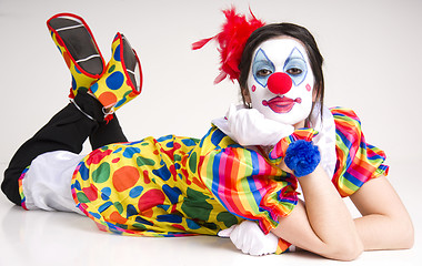 Image showing Laying down female circus clown entertainment character