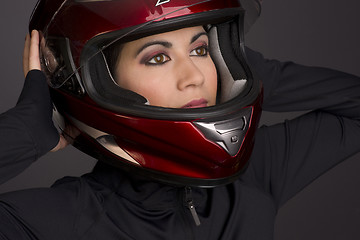 Image showing Adorable Female Wearing Red Full Face Racing Helmet