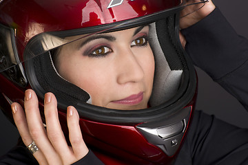 Image showing Red Full Face Helmet and Female Motorcycle Rider