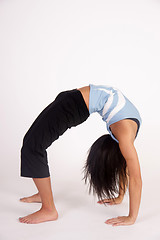 Image showing Beautiful Young Brunette Woman Practicing Yoga Meditation Pose