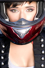 Image showing Girl With Pretty Green Eyes in Red Full Face Helmet