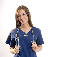 Image showing Beautiful Brunette Nurse Holds Her Stethoscope Looking at Camera