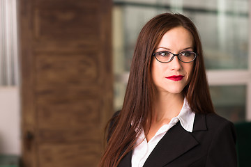 Image showing INtellectual Business Woman Female Eyeglasses Smiling Office Wor