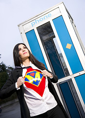 Image showing Super Mom Superhero Leaves Phone Booth Ready for Crimefighter Ro