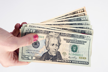 Image showing Female Hand Holds Cash Payment Currency Twenty Dollar Money Gree