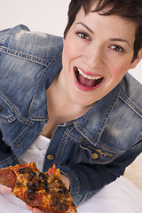 Image showing Excited Attractive Woman Eating Hot Pizza Lunch White Background