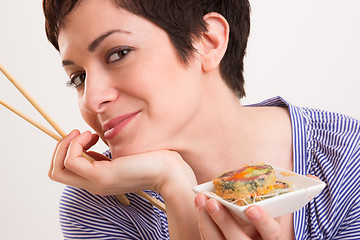 Image showing Candid Close Portrait Cute Brunette Woman Raw Food Sushi Lunch