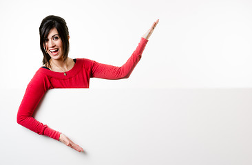 Image showing Female Presenter Stands Above Blank White Board Smiling Woman