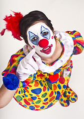 Image showing Female Circus Clown Pointing up at Camera