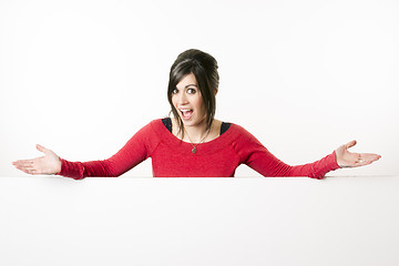 Image showing Female Presenter Stands Above Blank White Board Smiling Woman