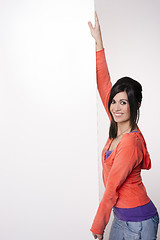 Image showing Female Presenter Stands At Blank White Board Smiling Woman