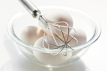 Image showing Eggs with whisk 