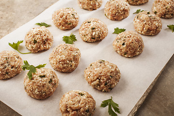 Image showing Meatballs cooking