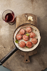 Image showing Meatballs cooking