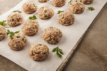 Image showing Meatballs cooking