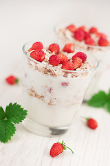 Image showing Yogurt with muesli and strawberries