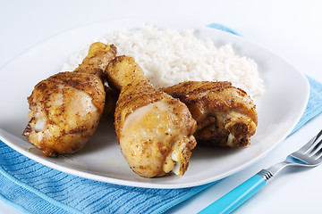 Image showing Roasted chicken legs with boiled rice