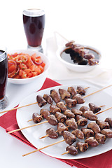 Image showing Grilled chicken hearts on skewers