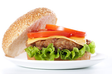 Image showing Cheeseburger with tomatoes and lettuce