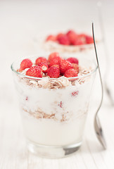 Image showing Yogurt with muesli and strawberries