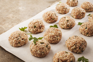 Image showing Meatballs cooking