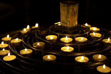 Image showing Candles lit as a prayer, Notre dame, cathedral, paris, france